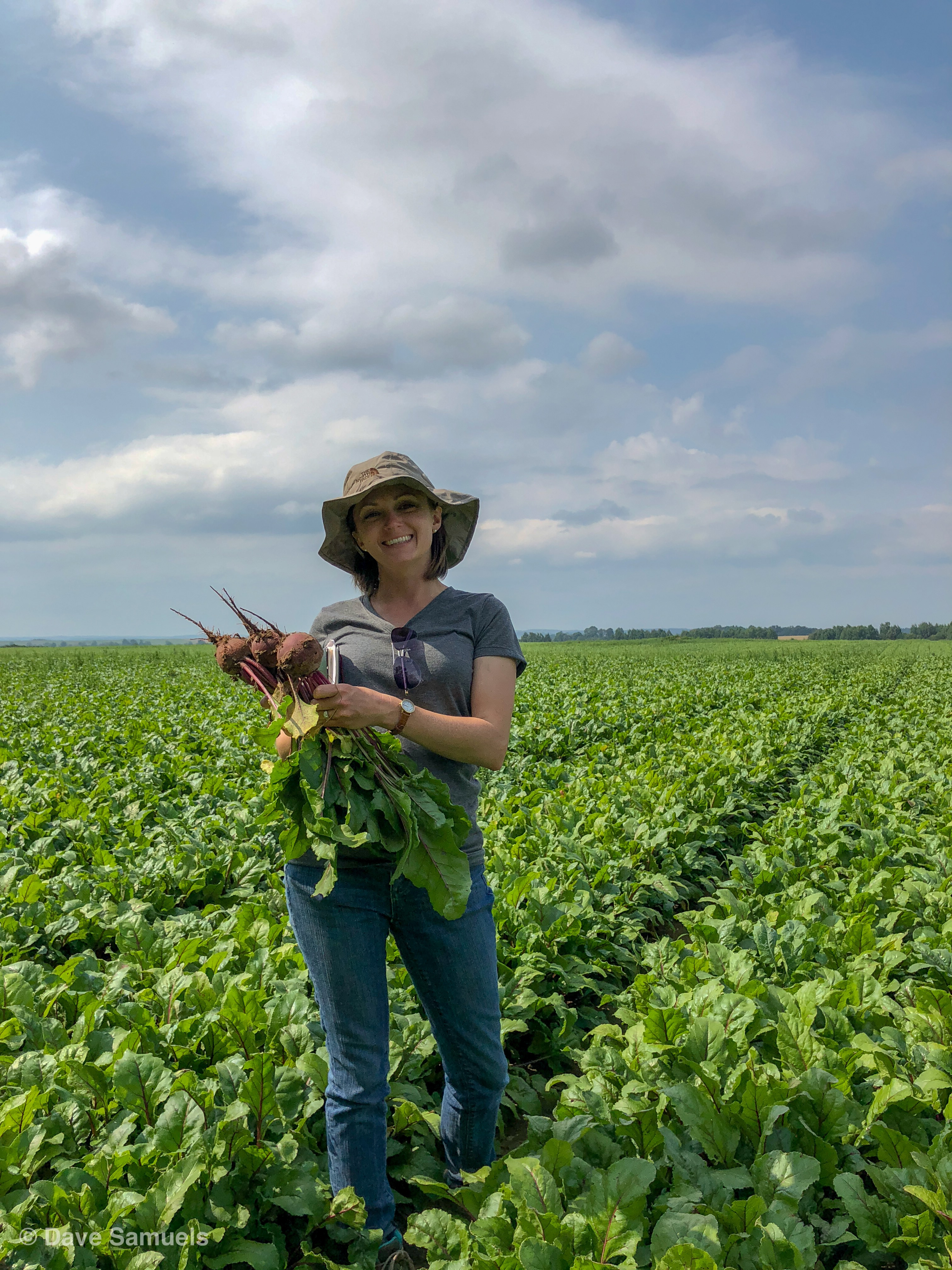Dr. Laura Ann McLoud Plant breeder, Laura Ann poses with a giant pumpkin